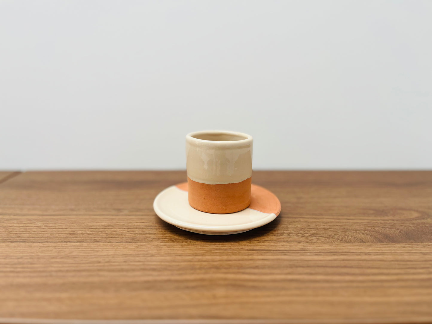 Coffee cup and saucer cream